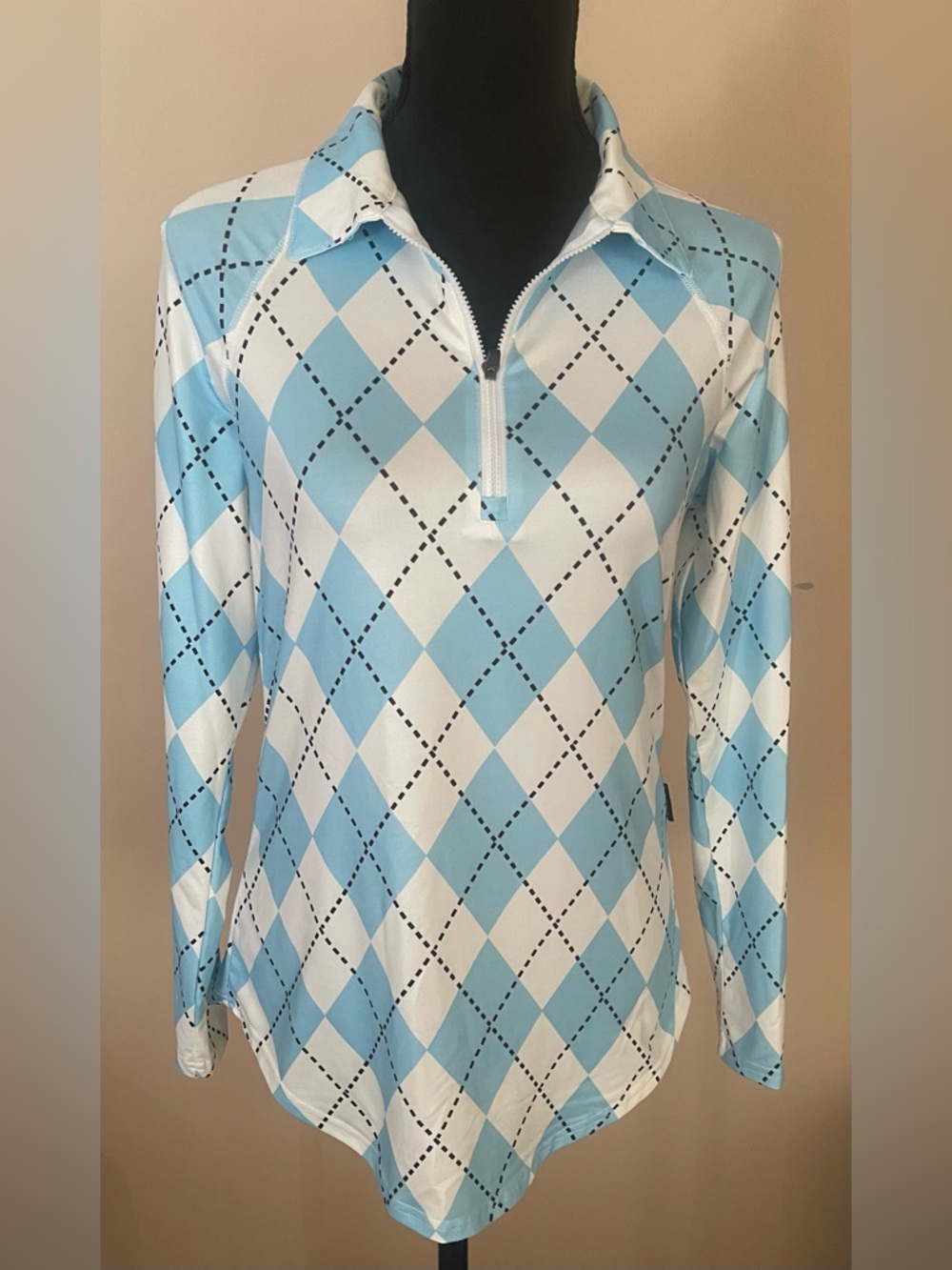 Like new Ladies Blue Argyle Quarter Zip Long Sleeve Shirt. Size small